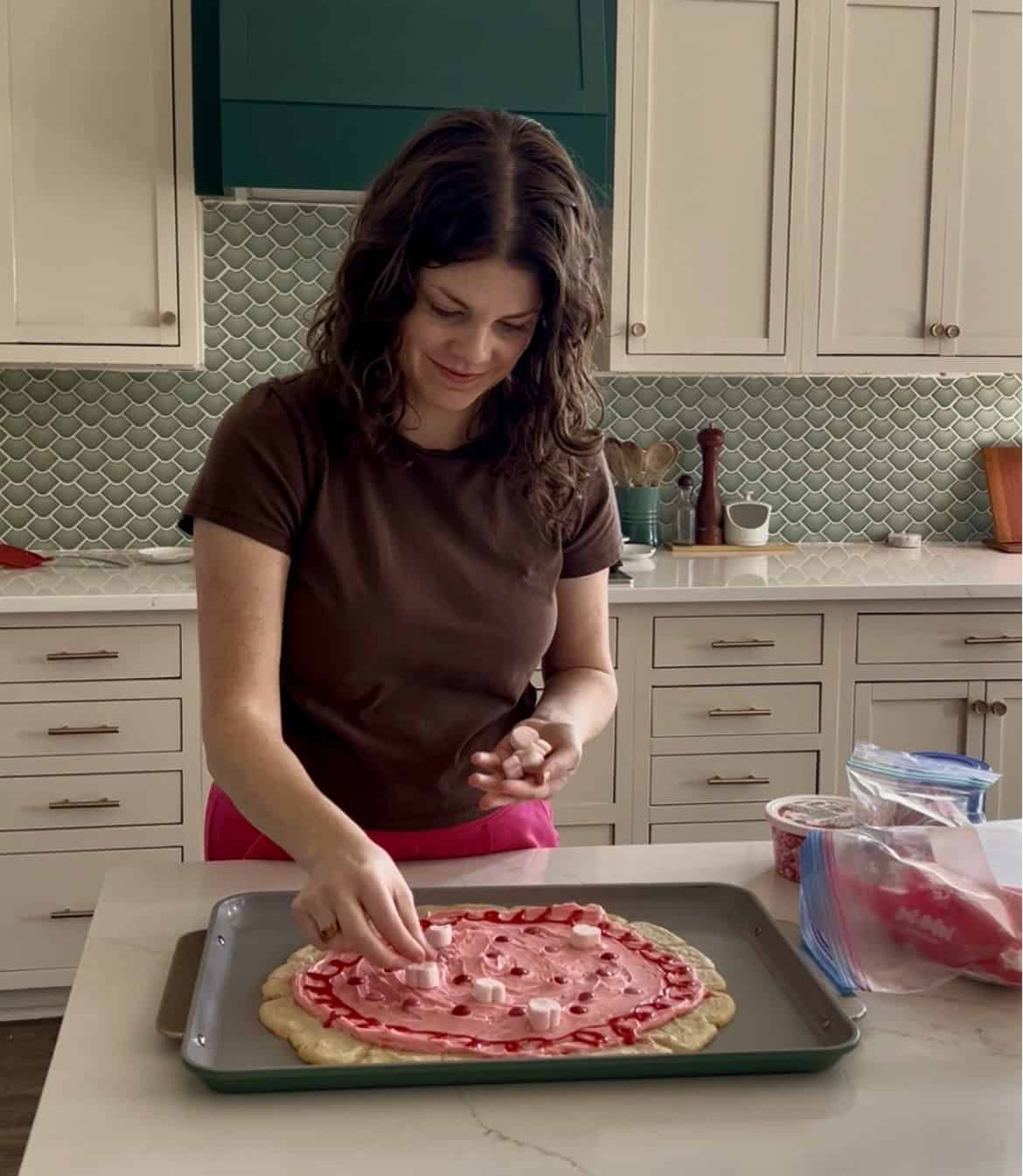 decorating a valentines day cookie cake