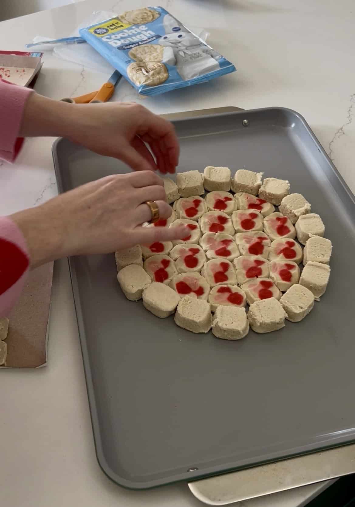making a valentines day cookie pizza