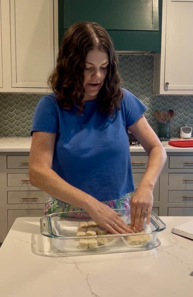 pressing sugar cookie dough into a pan
