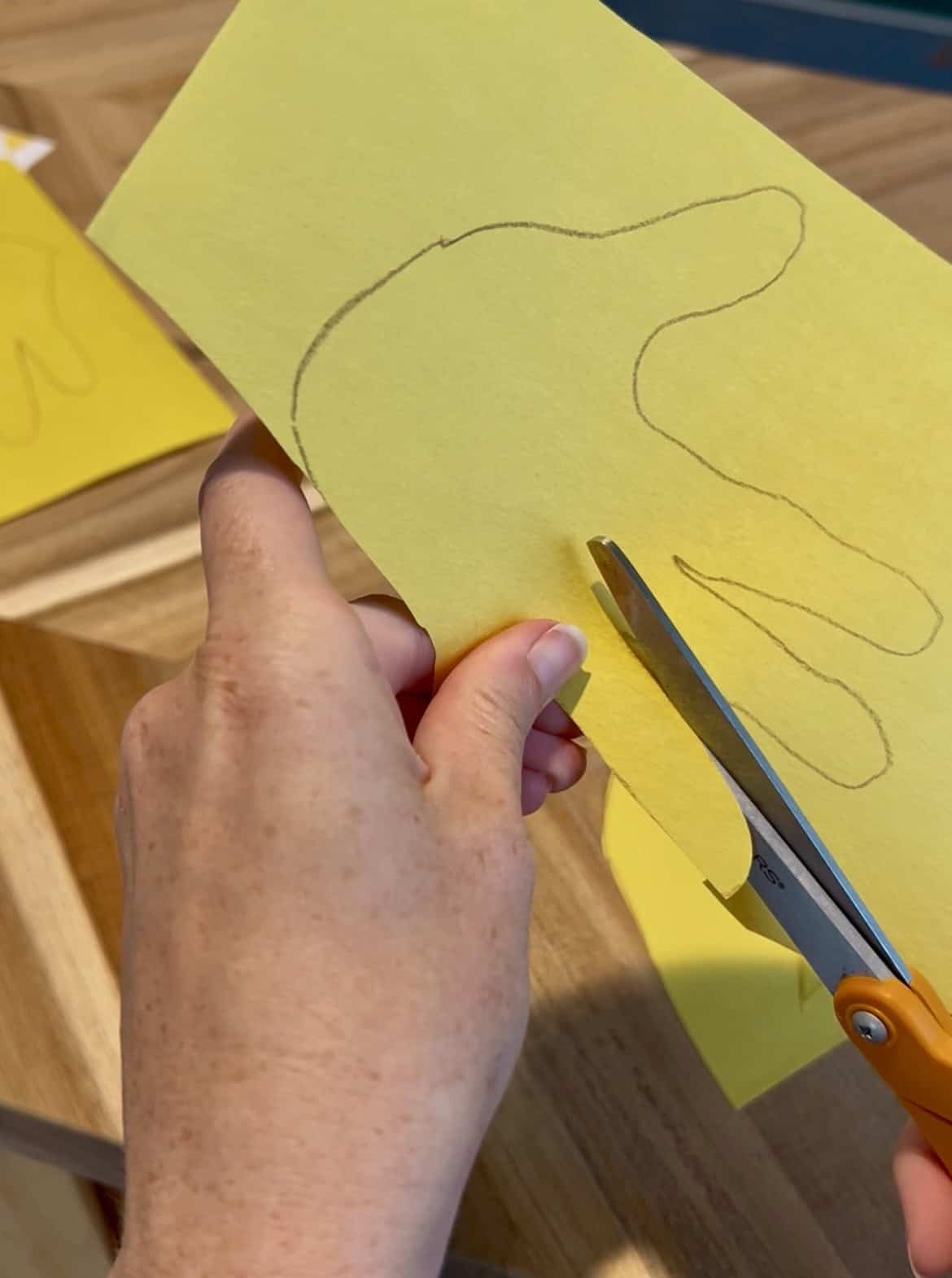 cutting a handprint