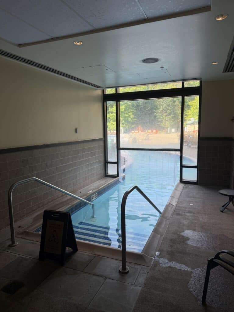 Indoor pool entrance at the Lodge at Spruce Peak